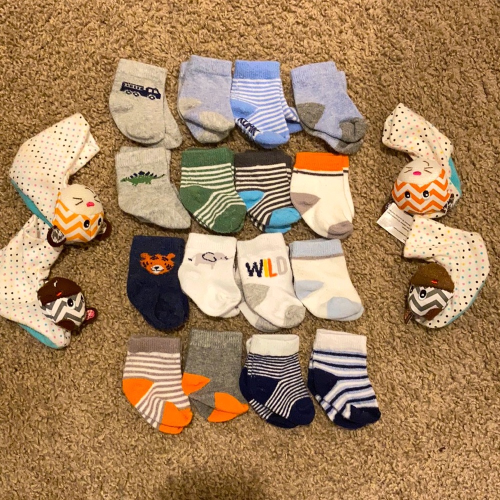 Carter’s Newborn Sock Set with 2 Footie Rattle Set